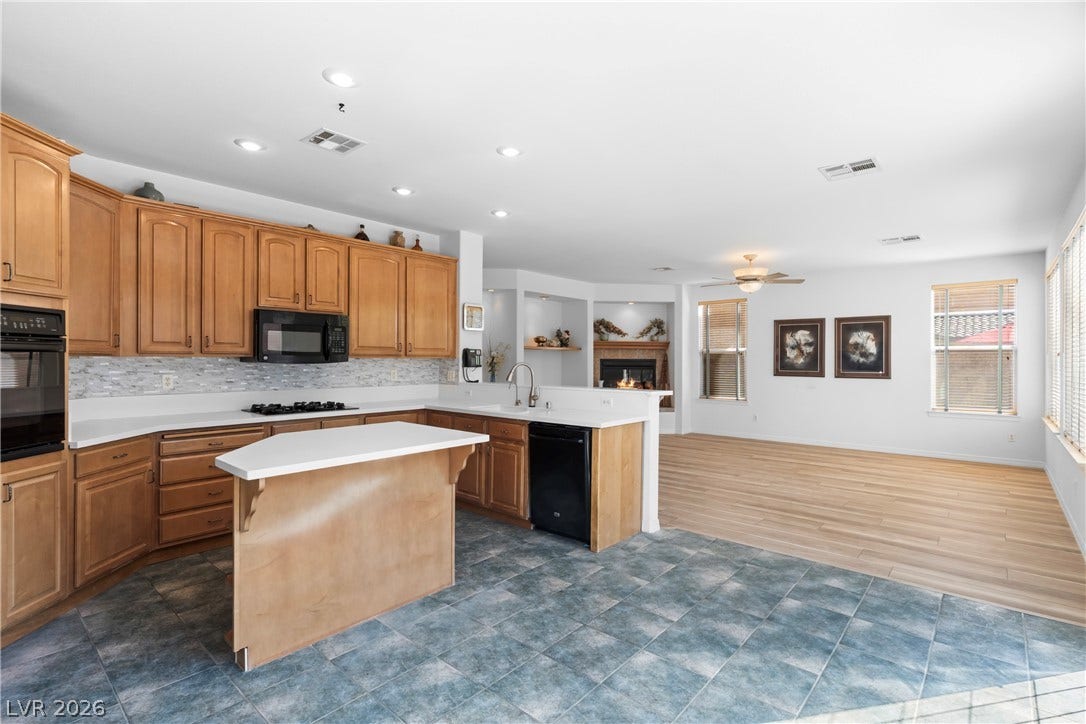 Well-lit open concept living, this kitchen and great room combination offers effortless entertaining.