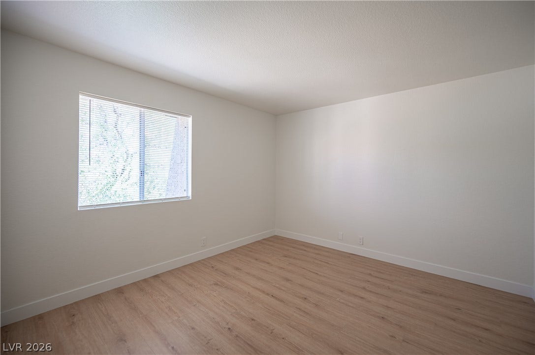 4381 Alexis Drive, #332, Las Vegas, NV 89103 Smooth wood floors and clean walls define this versatile interior space.