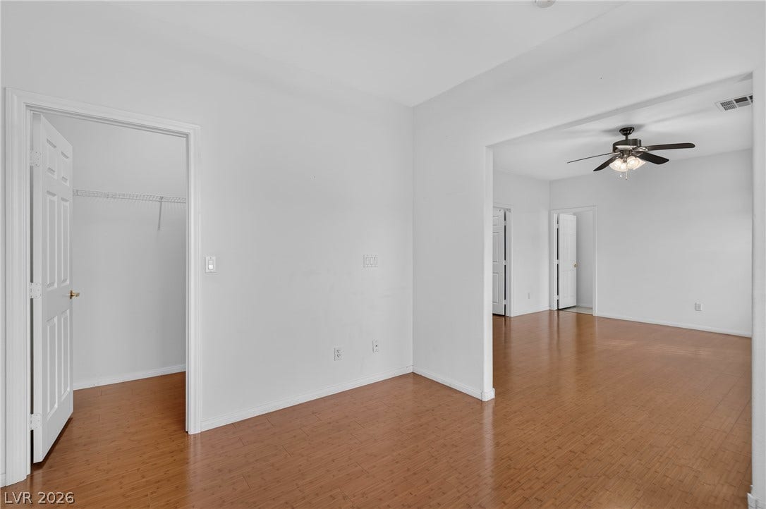4871 Lionesse Court, Las Vegas, NV 89130 Gleaming hardwood floors and a generous walk-in closet highlight this versatile interior space.