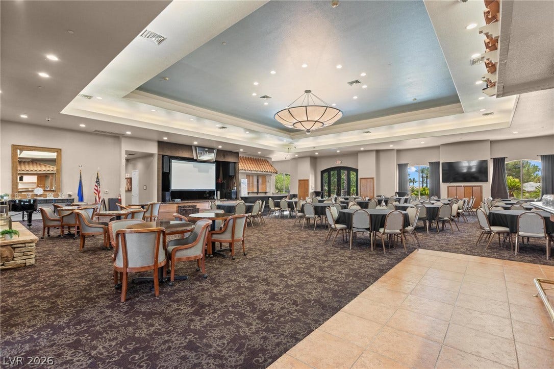 8175 Arville Street, #32, Las Vegas, NV 89139 An elegant tray ceiling with extensive recessed lighting defines this versatile community hall.