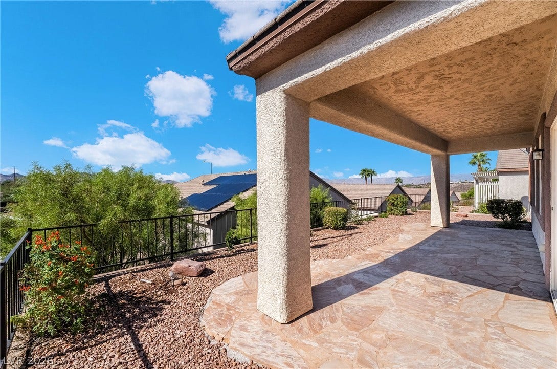 Covered patio offering shade and a place to relax while enjoying the mountain views