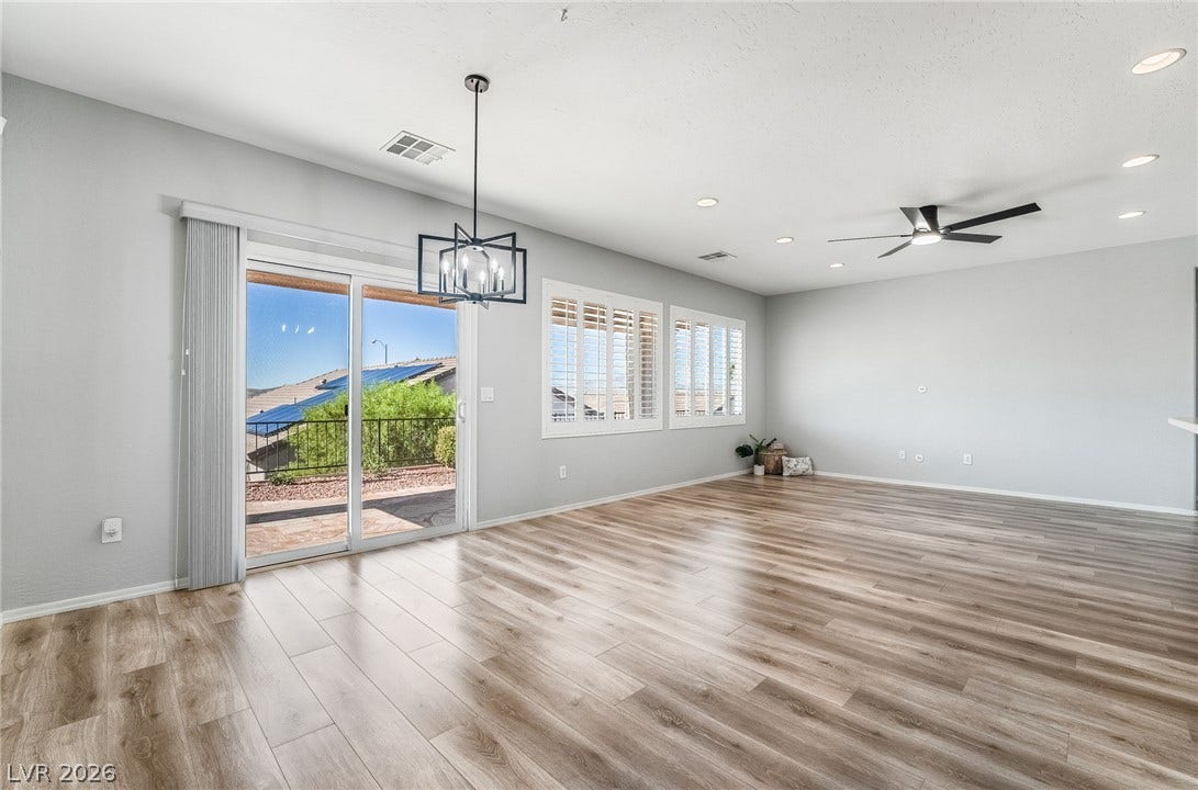 Views of the backyard with plenty of natural light