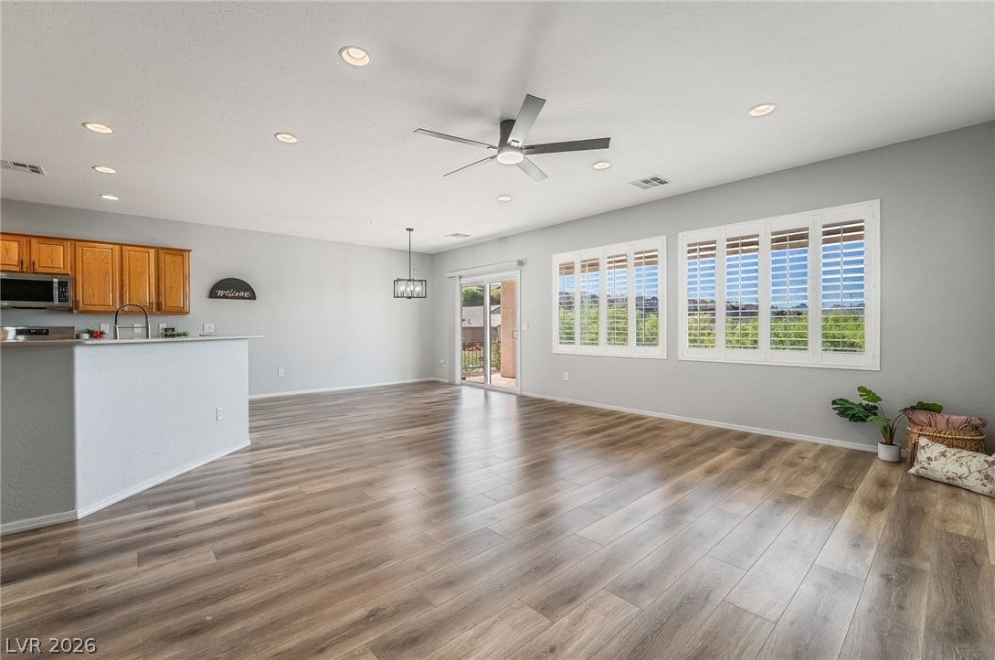 Shutters throughout offering privacy and control of natural light