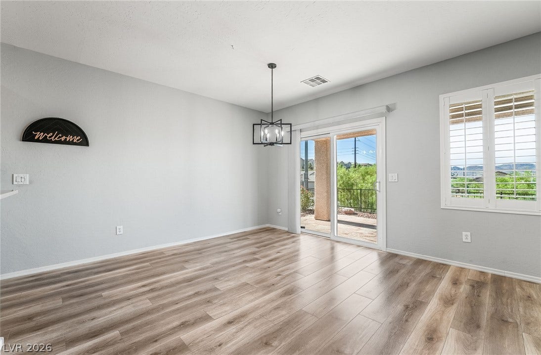 Sliding doors off the dining room create an easy indoor-outdoor flow, perfect for entertaining