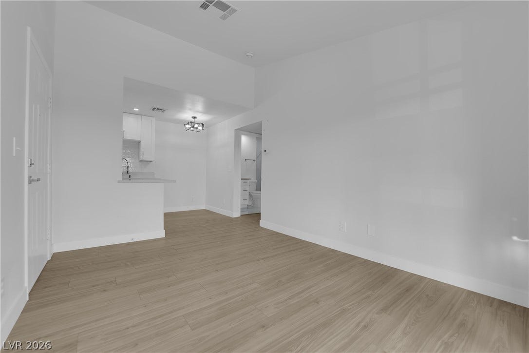 5111 Lindell Road, #202, Las Vegas, NV 89118 An open floorplan seamlessly connects the main living area to the kitchen.