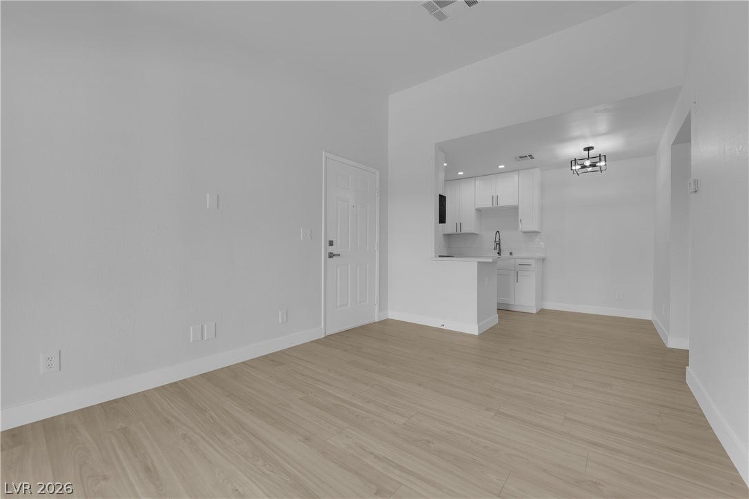 5111 Lindell Road, #202, Las Vegas, NV 89118 A spacious layout seamlessly connects the main living area to the kitchen.