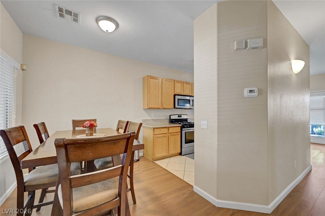 7450 S Eastern Avenue, #1064, Las Vegas, NV 89123 An open dining area flows directly into the adjacent kitchen space.