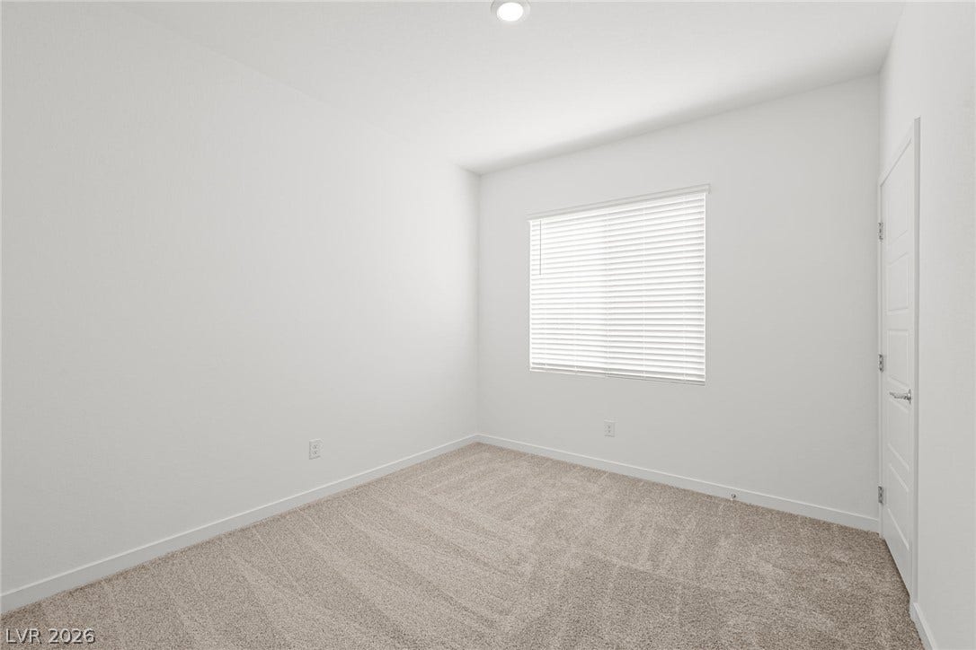 9568 Sagebrush Grove Street, Las Vegas, NV 89178 Plush carpeting and natural light define this versatile secondary space.