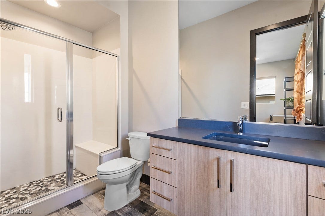 2999 The Peaks Lane, Las Vegas, NV 89138 Upstairs en-suite bathroom. Bedroom (4) with sitting area, custom walk-in closet and en-suite bathroom.