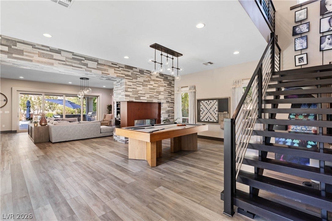 2999 The Peaks Lane, Las Vegas, NV 89138 Highly upgraded floating stairs and flex space/ gameroom.