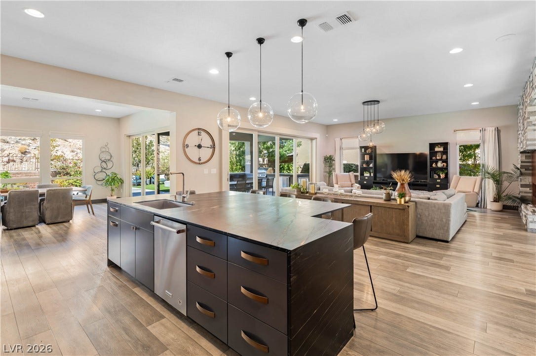 2999 The Peaks Lane, Las Vegas, NV 89138 Kitchen opens up into great room and formal dining area for seamless living