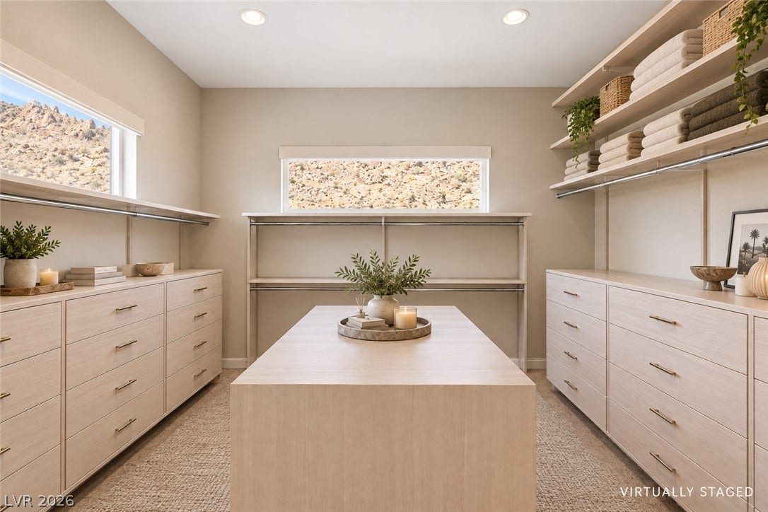 2999 The Peaks Lane, Las Vegas, NV 89138 Upstairs Primary bedroom (5)with large sitting area/gym separated by beautiful double sided fireplace. Huge Custom walk-in closet and highly upgraded primary bathroom and private balcony.