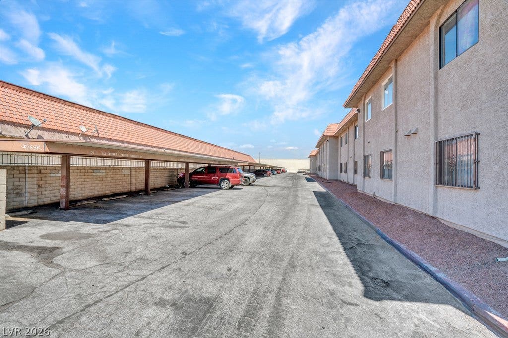 4300 N Lamont Street, #291, Las Vegas, NV 89115 Ample resident parking options include covered carports directly alongside the residential structure.