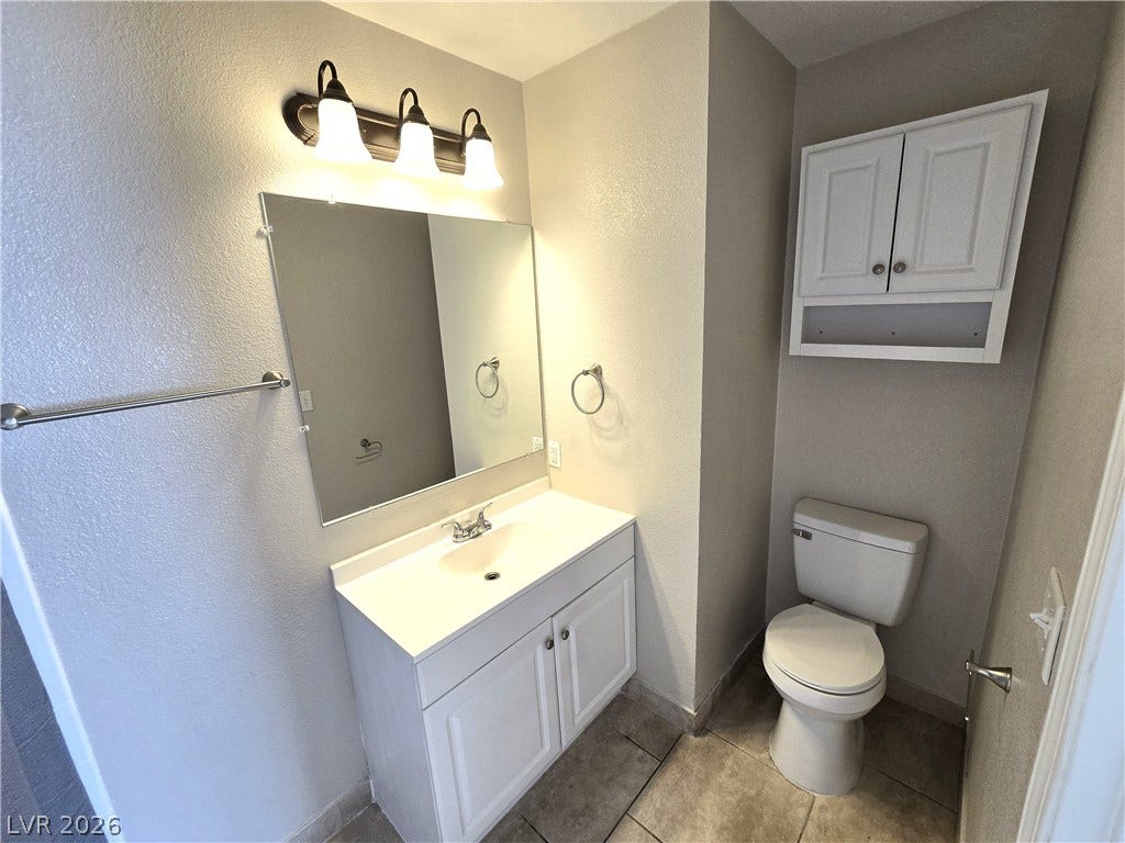 4300 N Lamont Street, #291, Las Vegas, NV 89115 Functional layout maximizes the footprint in this neutral-toned secondary bath.