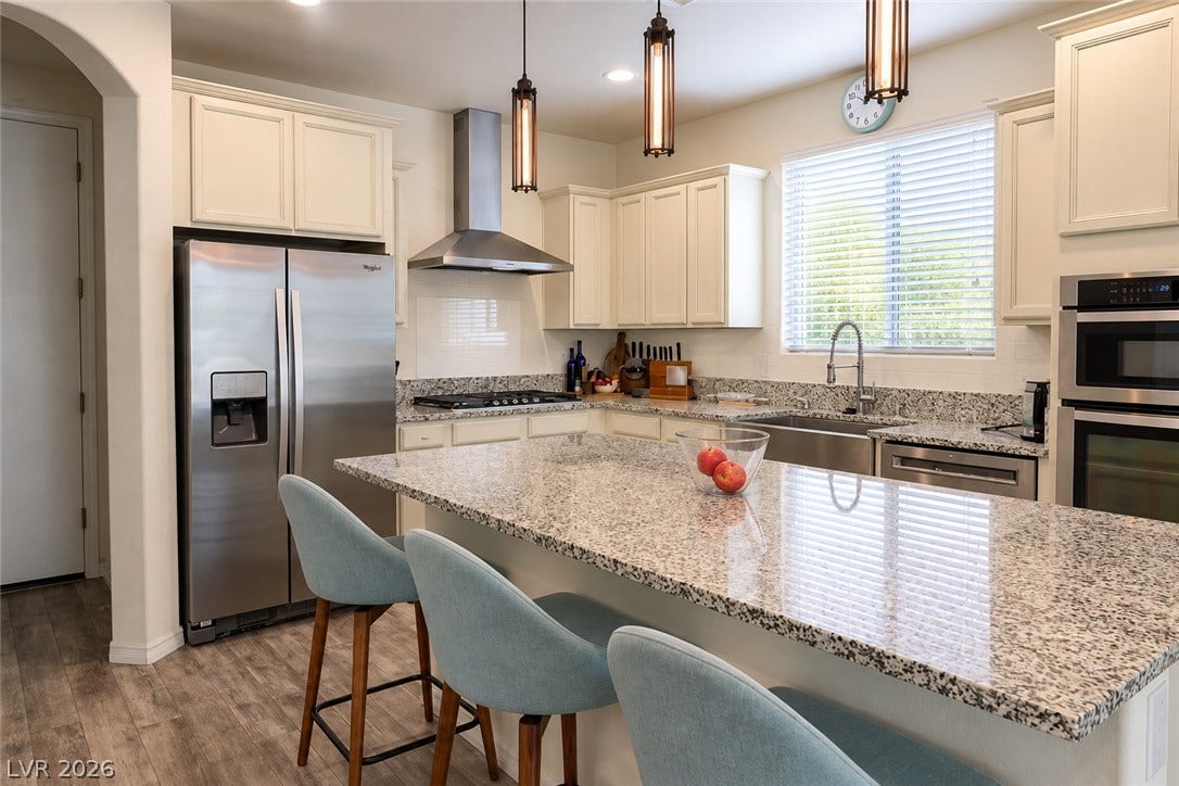 11886 Corenzio Avenue, Las Vegas, NV 89138 Polished granite countertops and classic cabinetry define this functional kitchen space.