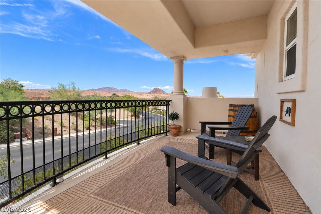10 Caminito Amore, Henderson, NV 89011 Breathtaking mountain and neighborhood views await from this covered private balcony.