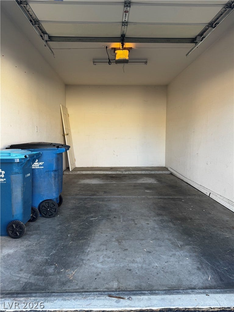 1900 N Torrey Pines Drive, #101, Las Vegas, NV 89108 Concrete floors and a tall ceiling define this functional storage space.