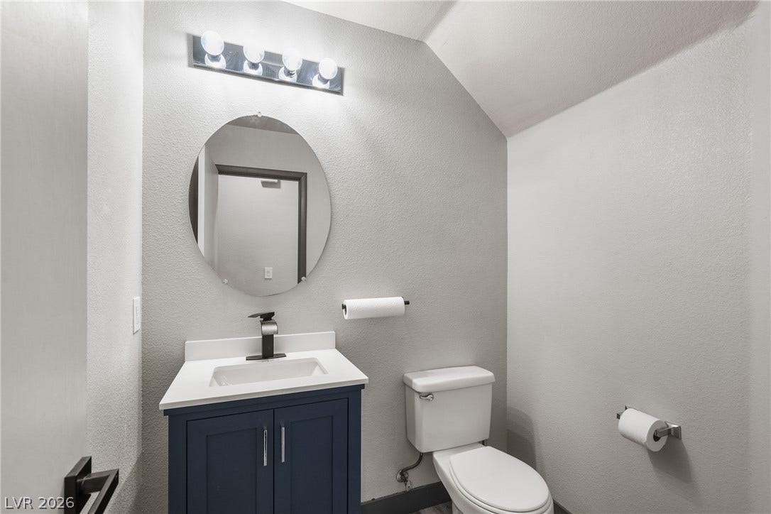 7066 Shimmering Avenue, Henderson, NV 89011 Half bathroom downstairs.