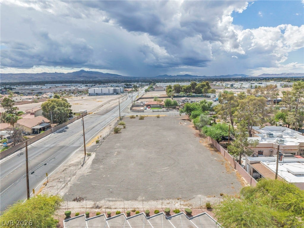 E Quail, Las Vegas, NV 89120 Distant mountain views frame this level commercial lot ready for development.