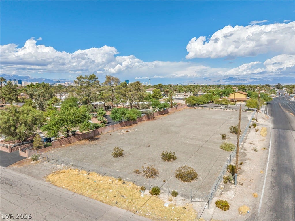 E Quail, Las Vegas, NV 89120 An expansive cleared lot sits ready for development under wide desert skies.