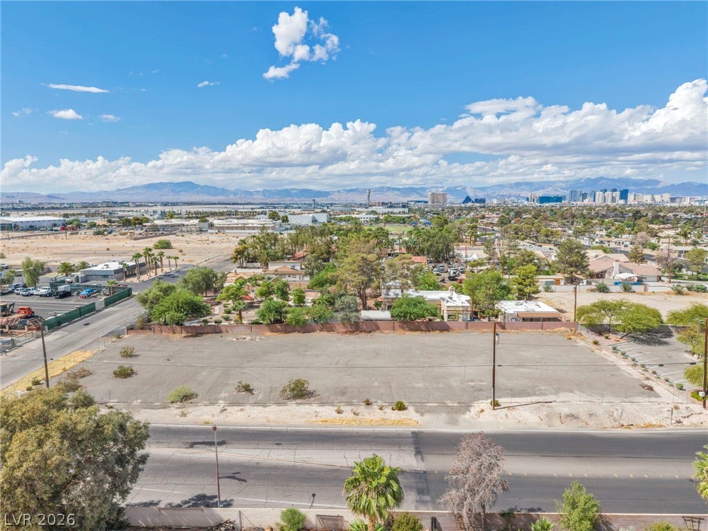 E Quail, Las Vegas, NV 89120 Distant skyline views and mountain ranges frame this expansive level lot.