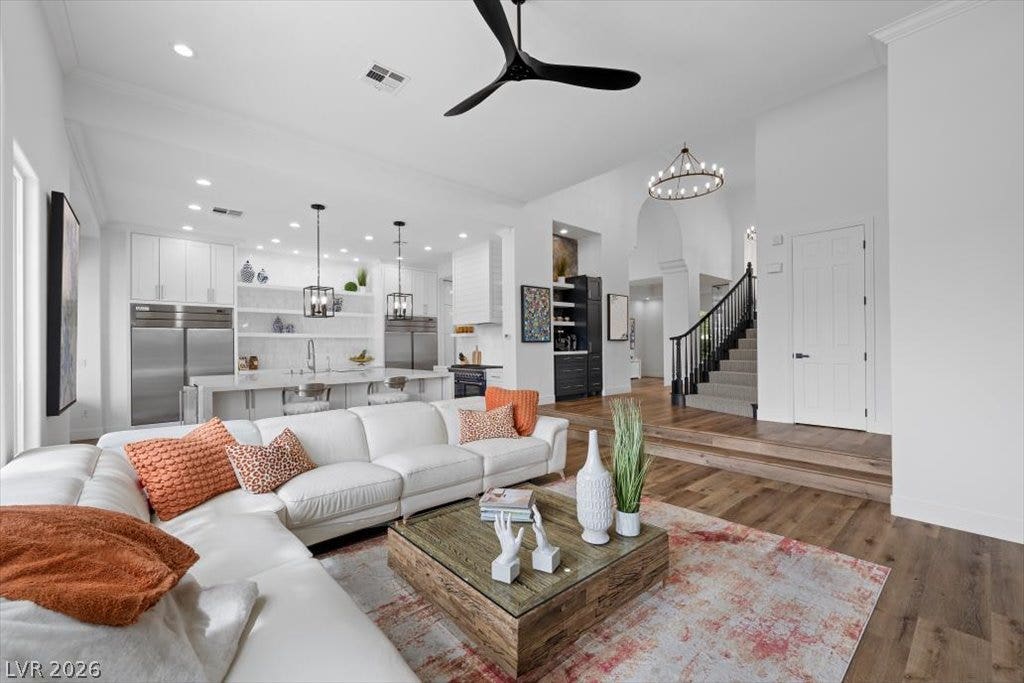 9521 Queen Charlotte Drive, Las Vegas, NV 89145 An open floorplan seamlessly connects the airy living area to a modern kitchen.