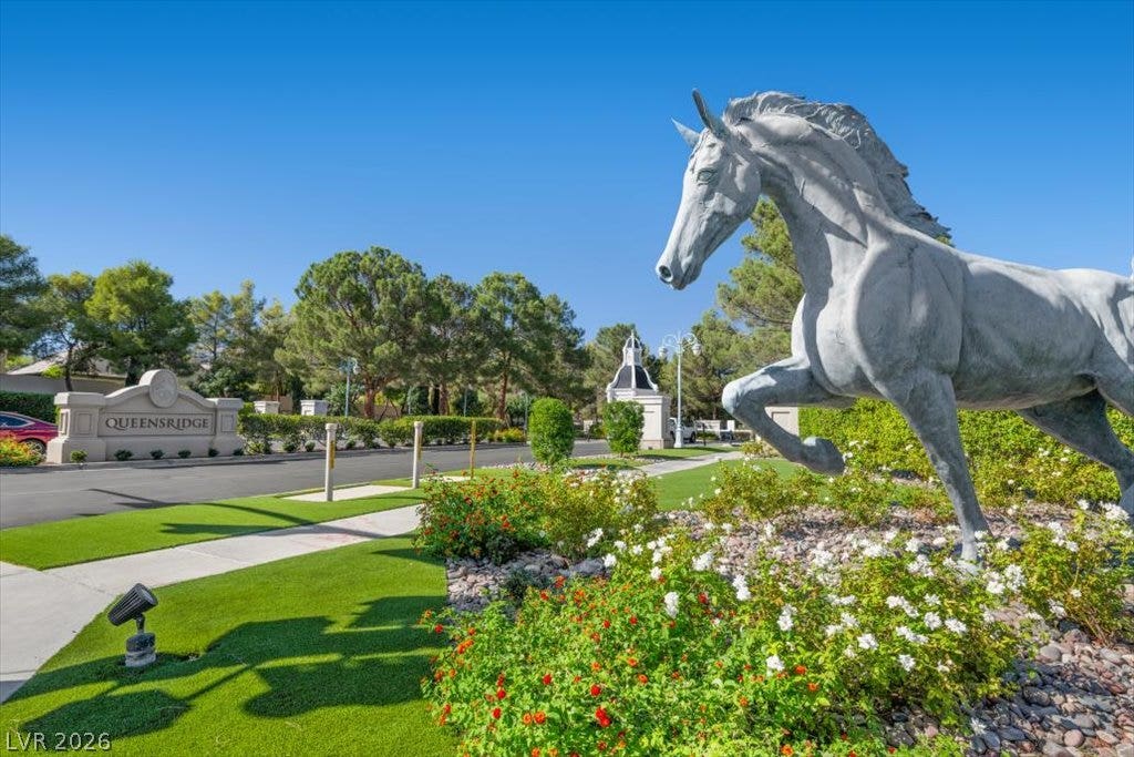 9521 Queen Charlotte Drive, Las Vegas, NV 89145 An impressive sculpted entrance welcomes residents to this prestigious gated community.