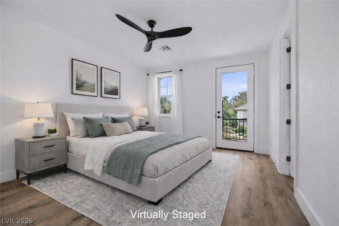 9521 Queen Charlotte Drive, Las Vegas, NV 89145 Gleaming hardwood floors and private outdoor access define this serene master retreat.