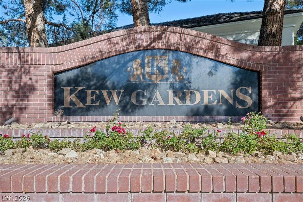 9521 Queen Charlotte Drive, Las Vegas, NV 89145 A prominent brick monument sign welcomes residents and guests to the established community.