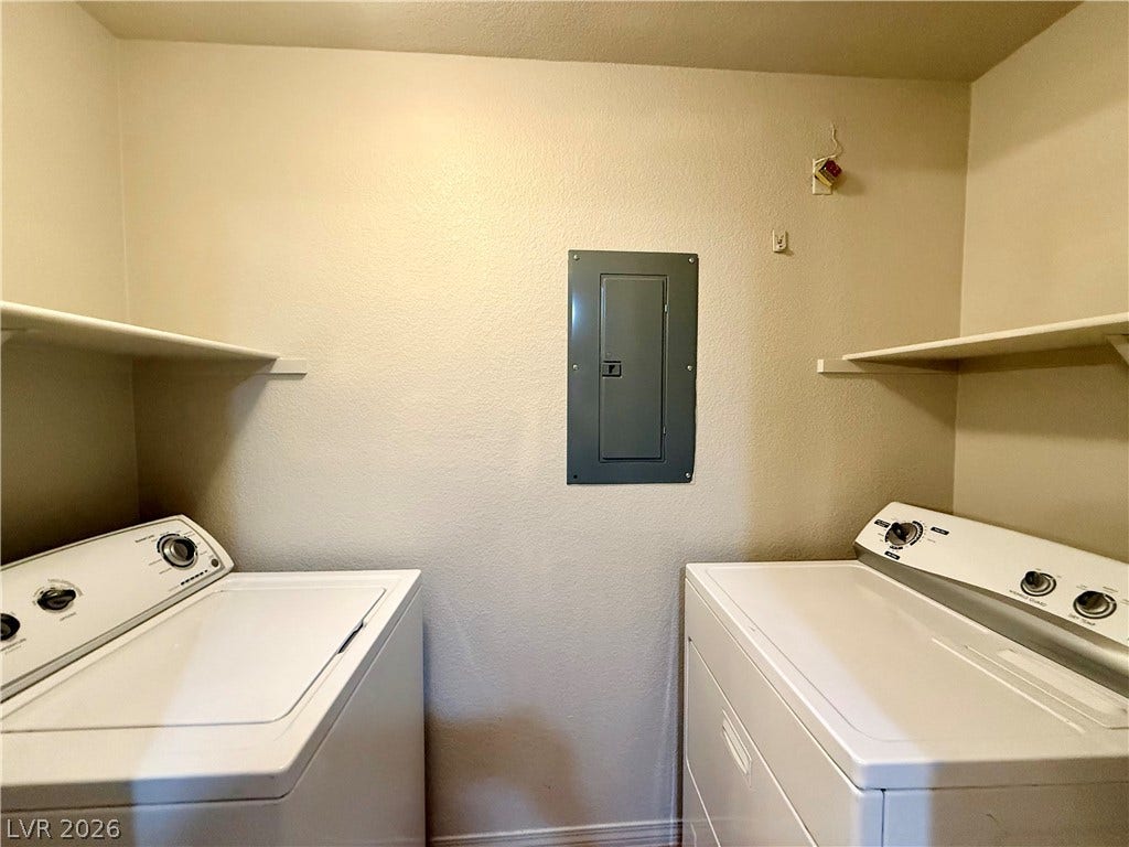 8777 W Maule Avenue, #1094, Las Vegas, NV 89148 Built-in shelving and dedicated utility connections maximize functionality in this functional laundry space.