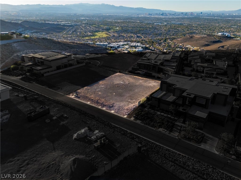 7 Sunset Strip, Henderson, NV 89012 An elevated perspective showcases a prime buildable lot overlooking the valley and distant city skyline.