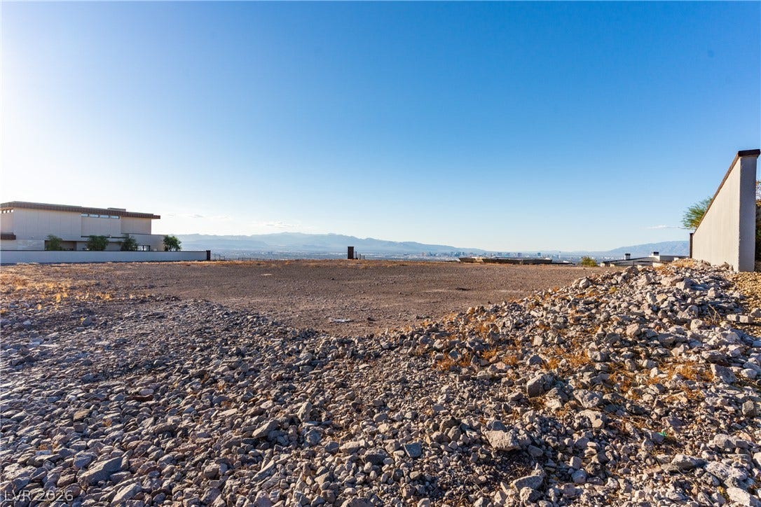 7 Sunset Strip, Henderson, NV 89012 A spacious vacant lot provides a blank canvas set against panoramic mountain and city skyline views.