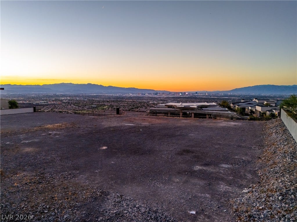 7 Sunset Strip, Henderson, NV 89012 Panoramas of the distant city skyline and mountain ranges unfold from this elevated plot.