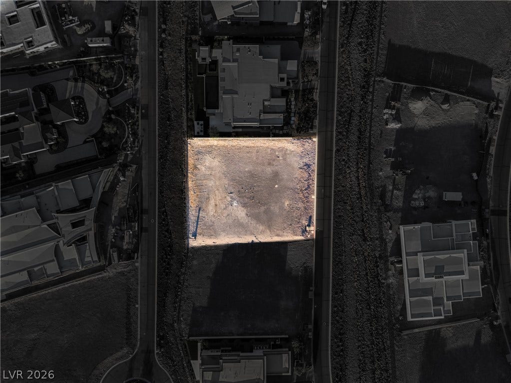 7 Sunset Strip, Henderson, NV 89012 An aerial perspective highlights the ready-to-build lot nestled within an established residential neighborhood.