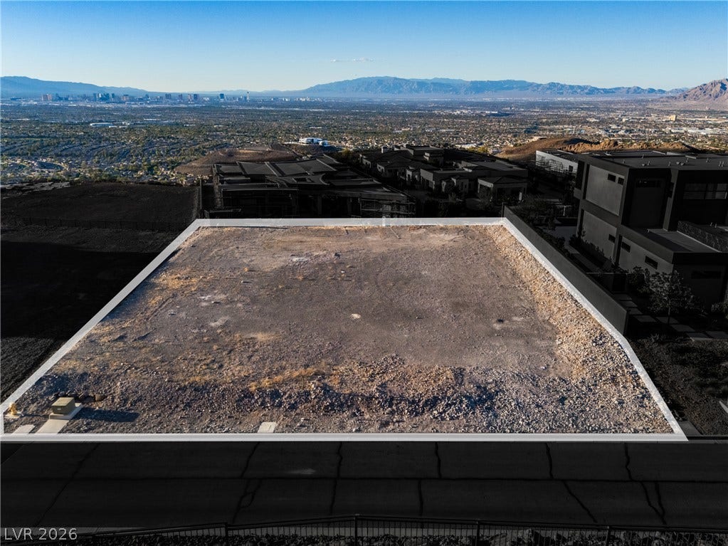 7 Sunset Strip, Henderson, NV 89012 An elevated building lot looks out over sweeping valley and distant mountain views.