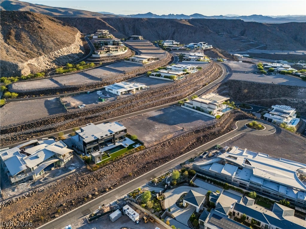 7 Sunset Strip, Henderson, NV 89012 Dramatic canyon topography surrounds this exclusive hillside enclave of contemporary luxury homes.