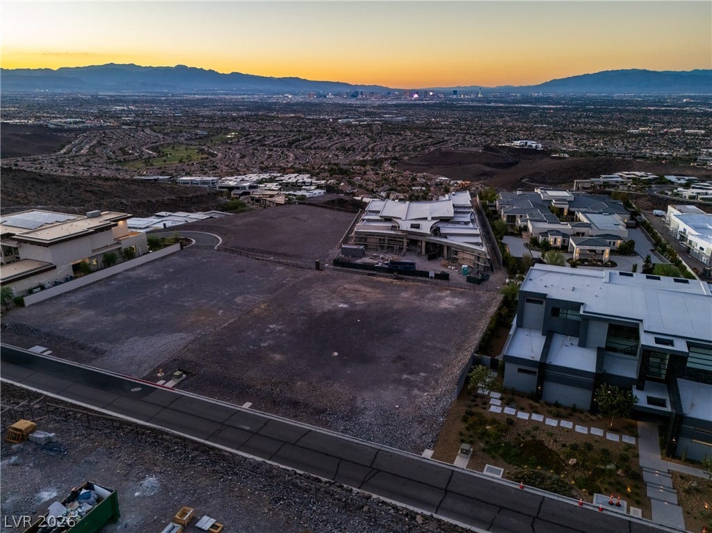 7 Sunset Strip, Henderson, NV 89012 An elevated perspective reveals graded home sites overlooking a sweeping valley and distant mountain ranges.
