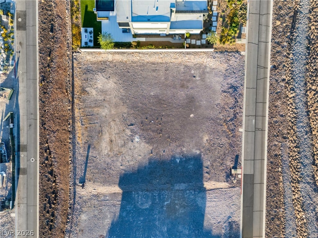 7 Sunset Strip, Henderson, NV 89012 An aerial view showcases a vacant residential lot ready for custom development.
