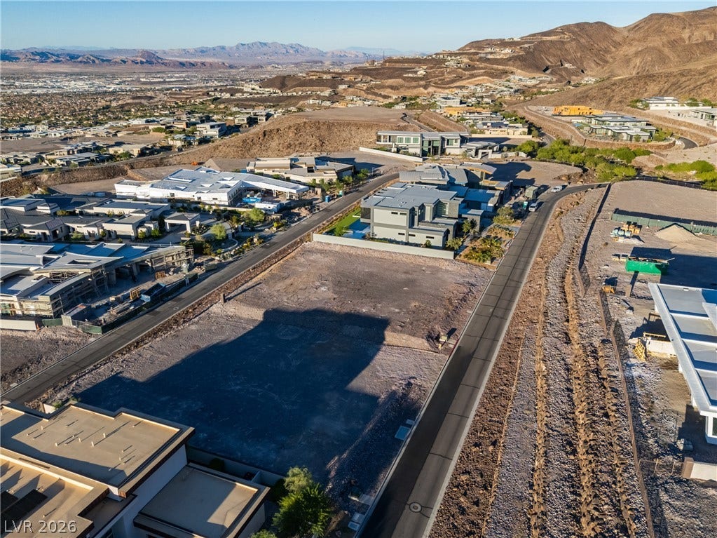 7 Sunset Strip, Henderson, NV 89012 An elevated perspective showcases a prime building parcel nestled within a hillside desert community.