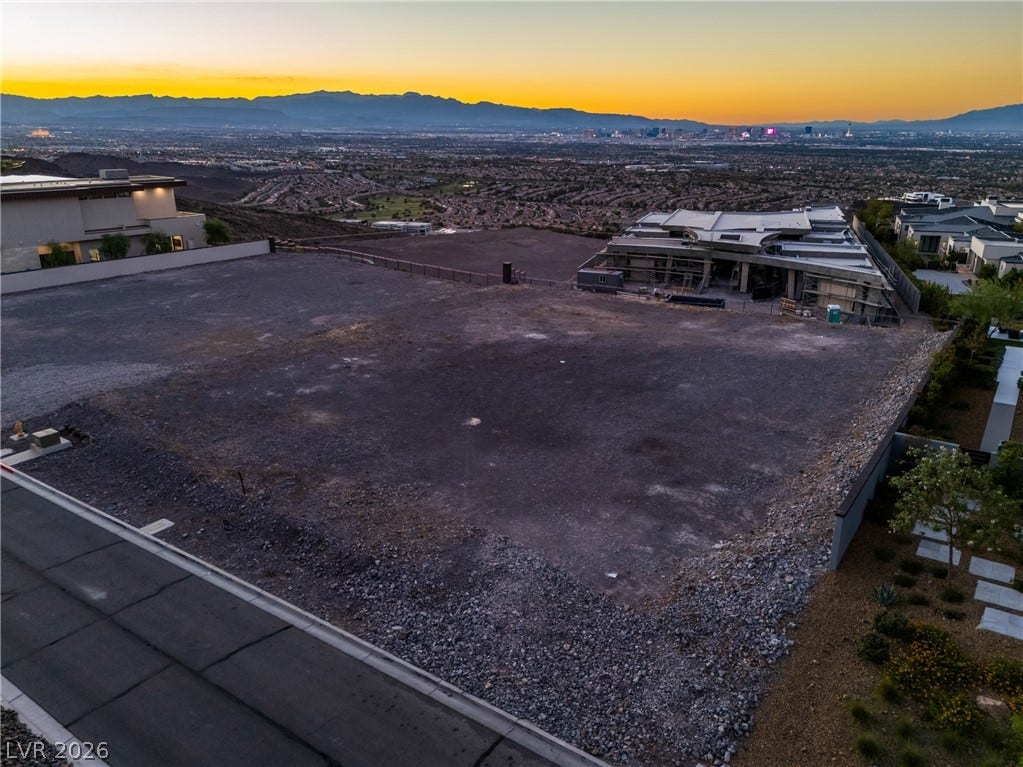 7 Sunset Strip, Henderson, NV 89012 An elevated building lot overlooks the valley, mountains, and city lights below.