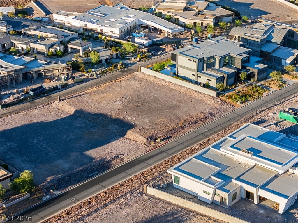 7 Sunset Strip, Henderson, NV 89012 An aerial perspective showcases a prime buildable parcel nestled among modern desert estates.