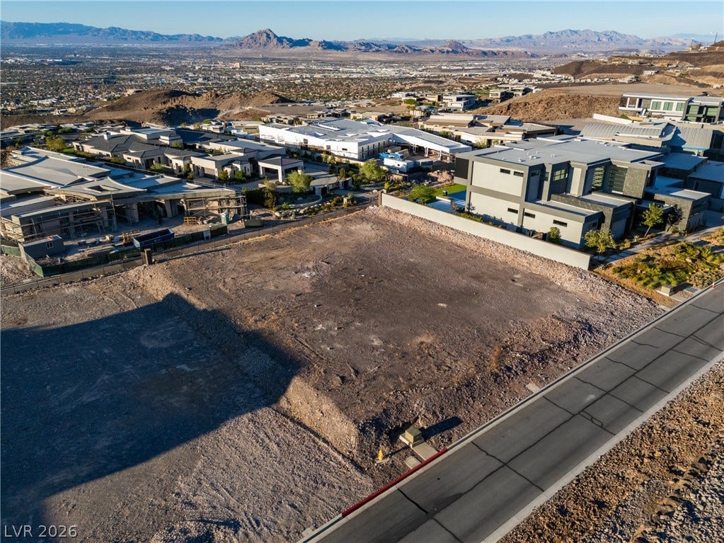 7 Sunset Strip, Henderson, NV 89012 An elevated perspective showcases a prime buildable parcel nestled within a gated mountain community.