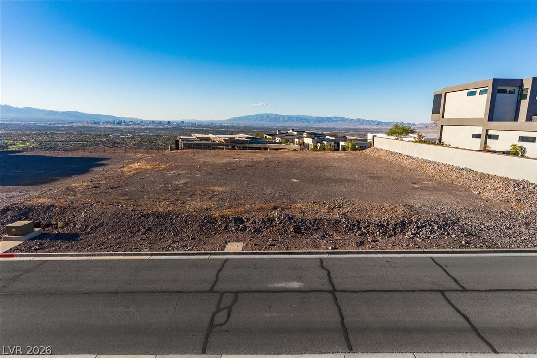 7 Sunset Strip, Henderson, NV 89012 An elevated hillside lot delivers sweeping panoramas of the valley and distant mountain ranges.