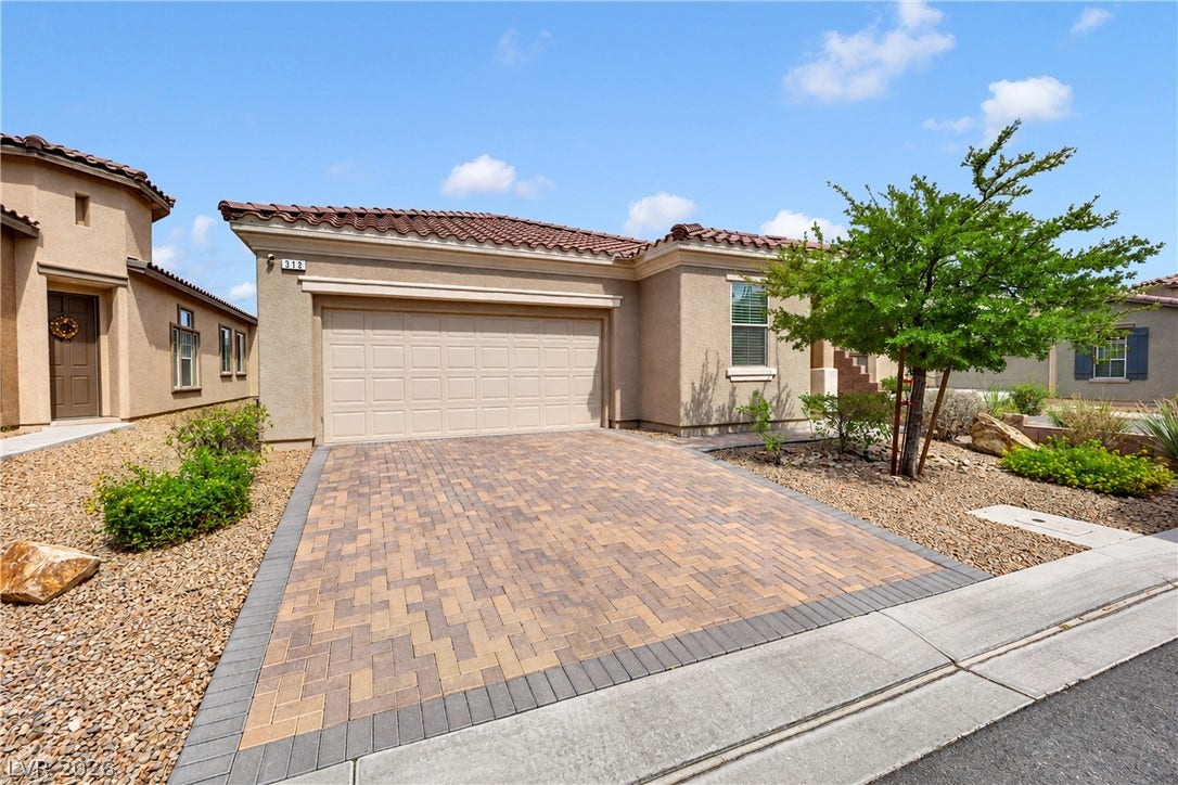 Stone paved driveway & walkway
