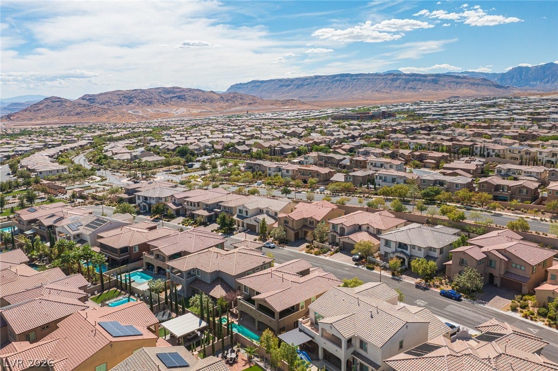 322 Elder View Drive, Las Vegas, NV 89138 Rugged mountains form a dramatic backdrop for this peaceful suburban community.