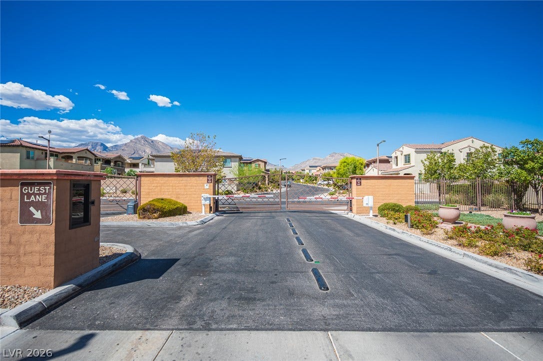 322 Elder View Drive, Las Vegas, NV 89138 Secured gated entry welcomes residents and guests to this serene desert neighborhood.