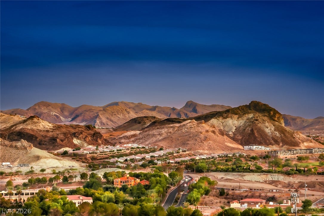 Dramatic mountain vistas rise above the peaceful valley neighborhood.