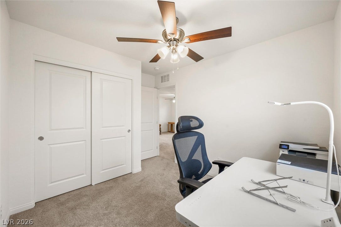 5651 Scarlet Rock Street, North Las Vegas, NV 89081 Soft carpeting underfoot provides a quiet atmosphere for this versatile office space.