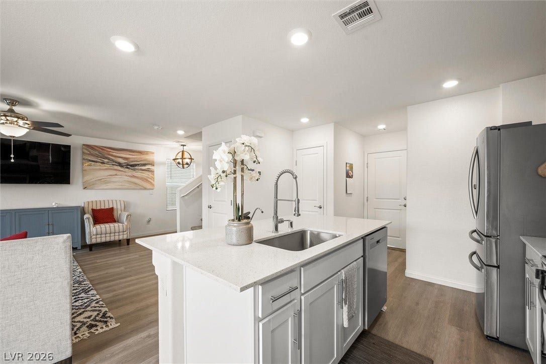 5651 Scarlet Rock Street, North Las Vegas, NV 89081 An open kitchen layout transitions smoothly into a comfortable adjoining living space.