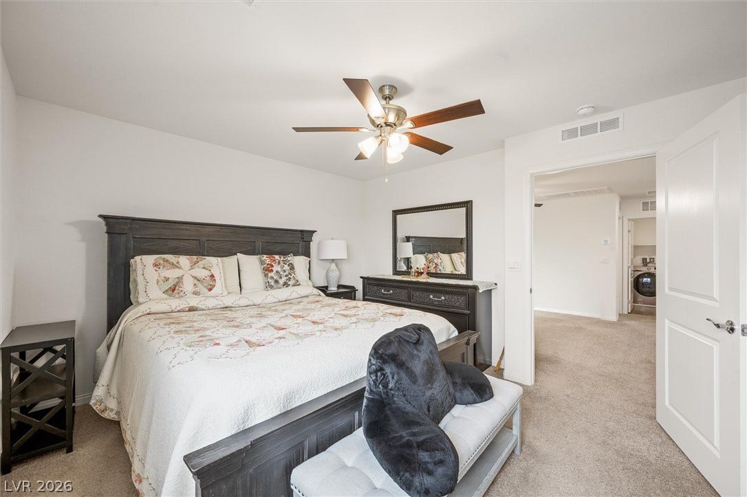 5651 Scarlet Rock Street, North Las Vegas, NV 89081 Soft wall-to-wall carpeting and neutral walls create a calm atmosphere in this private suite.